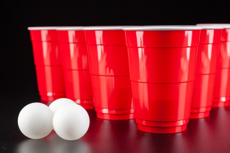 the-arrangement-of-red-plastic-cups-for-game-of-beer-pong_93675-104070